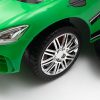 Zenélő bébitaxi vezetőrúddal Baby Mix RACER zöld